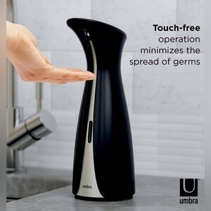 Brand new Umbra automatic soap dispenser in black color, in original packaging.